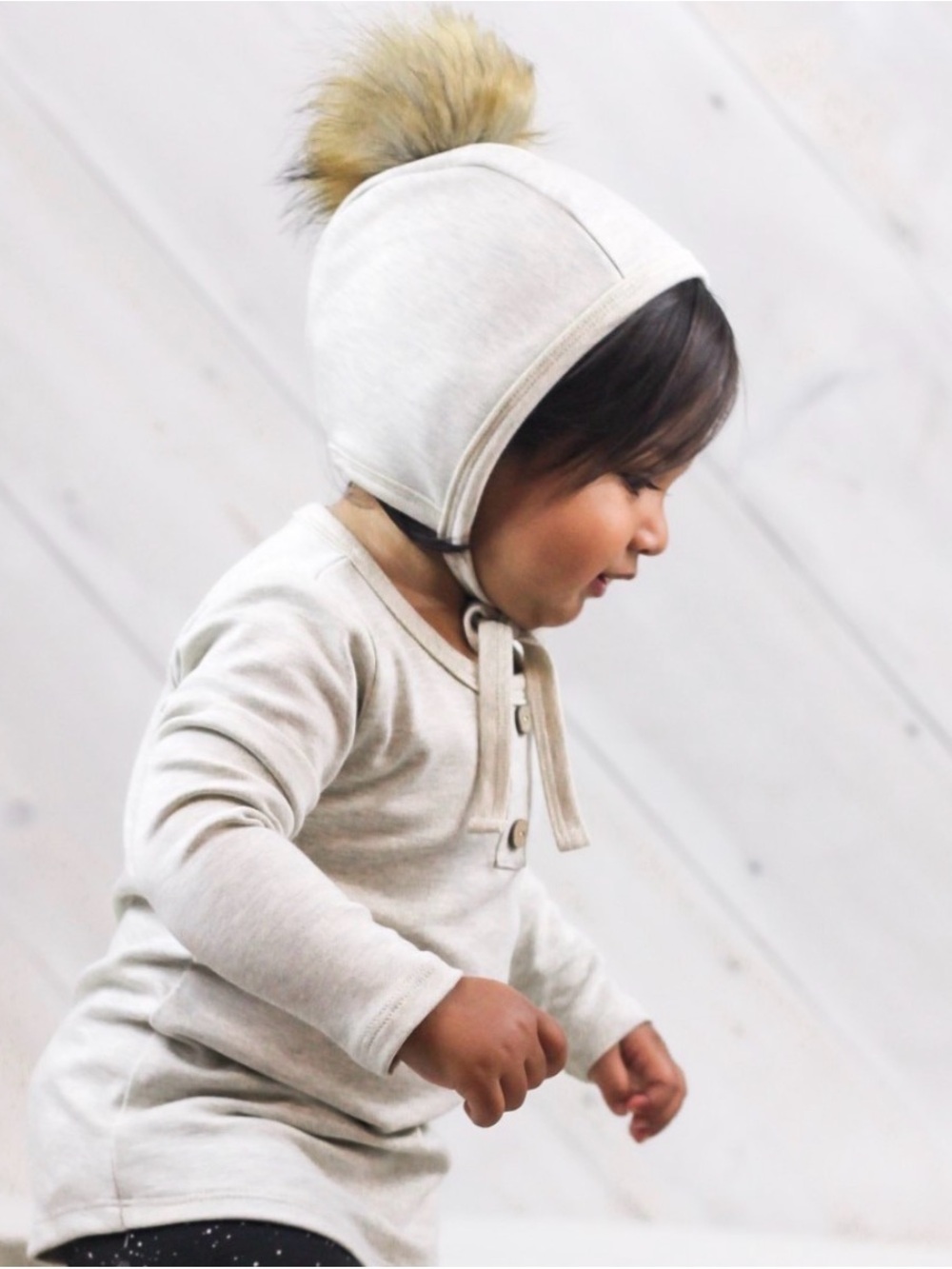 Little & Lively fleece lined bamboo cream kids Hat with Faux Fur Pom and tie